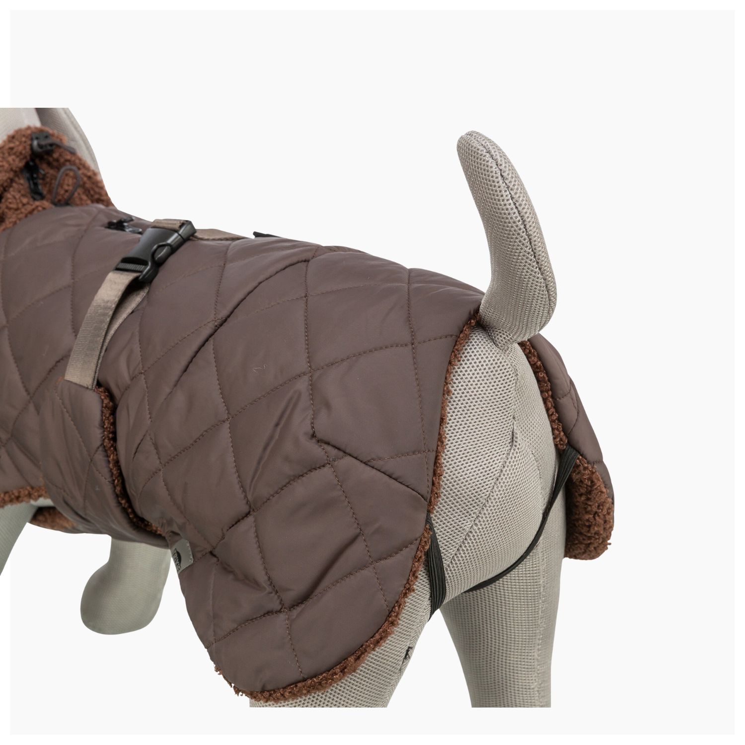 Deep quilted texture on Trixie brown dog coat with harness hole